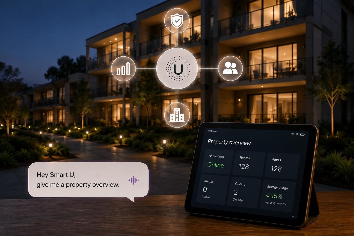 An apartment complex at dusk with a tablet showing a property overview